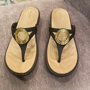 Brown crocs.  Size 7